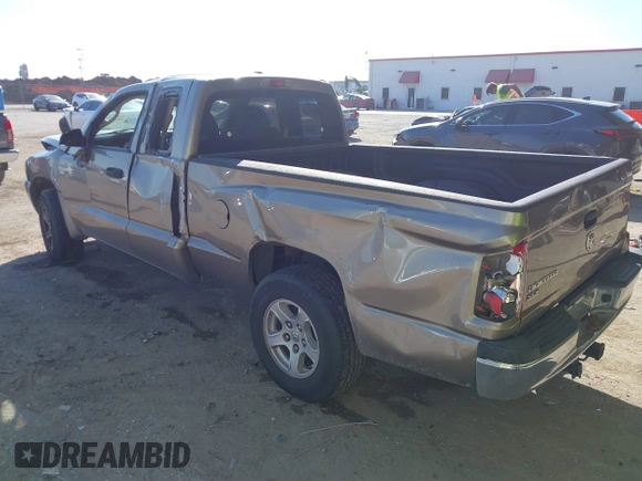 2006 Dodge Dakota SLT with VIN 1D7HE42K16S666071, listed as a IAAI auction lot 41676231 with 129,977 mi miles and . Bid and sale history available at carsss.com. Image 3.