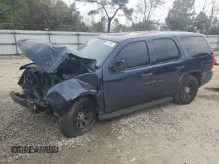 2014 Chevrolet Tahoe Commercial z VIN 1GNLC2E08ER209599, wystawiony jako Copart lot #51018165 z przebiegiem 111 585 mil mil oraz Szkoda całkowita • Salvage title. Historia ofert i sprzedaży dostępna na DreamBid. Obrazek 1.