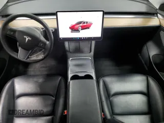 2023 Tesla Model 3 with VIN 5YJ3E1EA6PF455789, listed as a Copart auction lot 54715665 with 64,658 mi miles and Salvage Title. Bid and sale history available at DreamBid. Image 8.