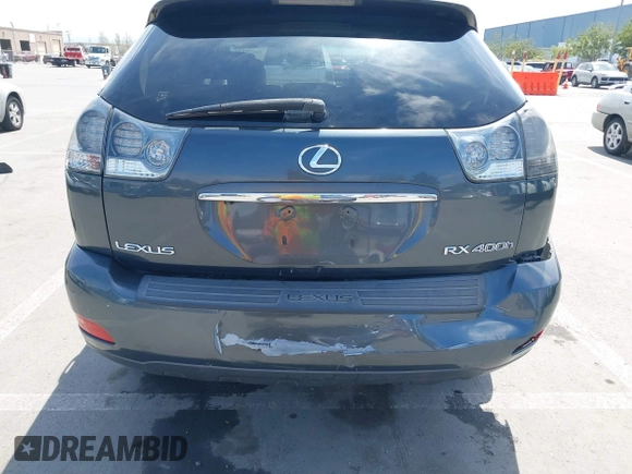 2007 Lexus RX 400h with VIN JTJGW31U372001817, listed as a IAAI auction lot 42047143 with 155,767 mi miles and . Bid and sale history available at DreamBid. Image 6.