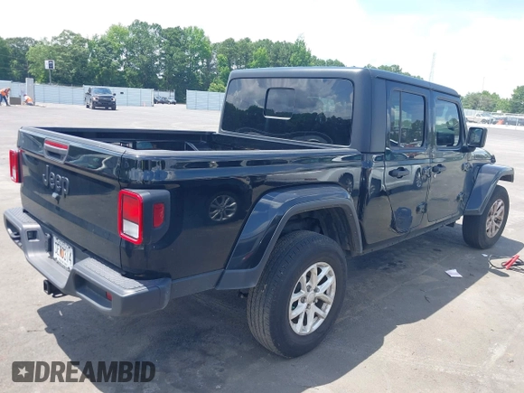 2023 Jeep Gladiator Sport S with VIN 1C6HJTAGXPL543319, listed as a IAAI auction lot 42499587 with 45,140 mi miles and . Bid and sale history available at DreamBid. Image 4.