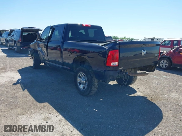 2017 Ram 2500 Tradesman with VIN 3C6UR5CL6HG790882, listed as a IAAI auction lot 42075668 with 125,236 mi miles and . Bid and sale history available at DreamBid. Image 3.