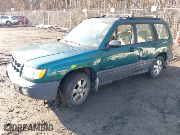 1999 Subaru Forester L with VIN JF1SF635XXH735202, listed as a IAAI auction lot 41489355 with 290,000 mi miles. Bid and sale history available at carsss.com. Image 17.