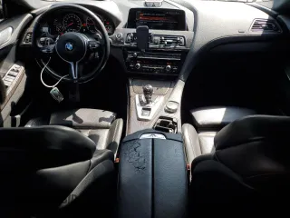 2017 BMW M6 z VIN WBS6E9C53HG437414, wystawiony jako Copart lot #61141685 z przebiegiem 89 893 mil mil oraz Szkoda całkowita • Salvage title. Historia ofert i sprzedaży dostępna na DreamBid. Obrazek 8.