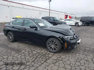 2021 BMW 3 Series 330i xDrive with VIN 3MW5R7J08M8C16500, listed as a IAAI auction lot 41469052 with 21,660 mi miles. Bid and sale history available at carsss.com. Image 1.