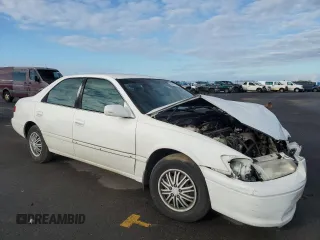 2000 Toyota Camry CE with VIN 4T1BG22K3YU948133, listed as a Copart auction lot 46627315 with 50,914 mi miles and Salvage Title. Bid and sale history available at DreamBid. Image 4.