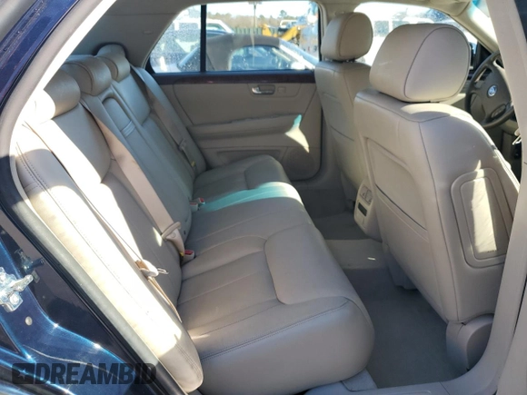 2006 Cadillac DTS 1SB z VIN 1G6KD57Y56U220535, wystawiony jako Copart lot #89196185 z przebiegiem 94 312 mil mil oraz Szkoda całkowita • Salvage title. Historia ofert i sprzedaży dostępna na DreamBid. Obrazek 10.