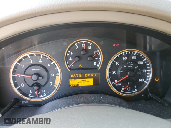 2013 Nissan Armada SL z VIN 5N1BA0ND1DN605912, wystawiony jako Copart lot #53389245 z przebiegiem 165 715 mil mil oraz Szkoda całkowita • Salvage title. Historia ofert i sprzedaży dostępna na DreamBid. Obrazek 9.