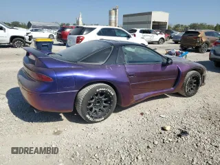 1998 Mitsubishi 3000GT GT z VIN JA3AM84J9WY001795, wystawiony jako Copart lot #74375954 z przebiegiem 106 765 mil mil oraz Szkody całkowita. Historia ofert i sprzedaży dostępna na DreamBid. Obrazek 3.