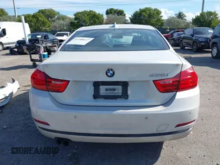 2016 BMW 4 Series 428i with VIN WBA3N7C57GK227468, listed as a IAAI auction lot 41188647 with 81,115 mi miles and . Bid and sale history available at carsss.com. Image 17.