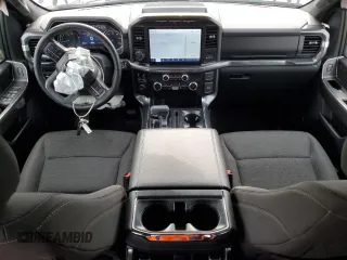2023 Ford F-150 XL with VIN 1FTEW1C59PFC27499, listed as a Copart auction lot 54453255 with 58,554 mi miles and Salvage title. Bid and sale history available at DreamBid. Image 8.