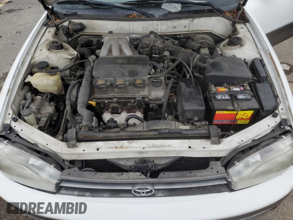 1994 Toyota Camry XLE with VIN JT2GK13E5R0008509, listed as a Copart auction lot 76014164 with 188,427 mi miles and Salvage Title. Bid and sale history available at carsss.com. Image 11.