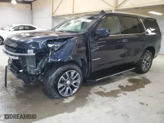 2023 Chevrolet Tahoe LT with VIN 1GNSCNKD0PR380094, listed as a Copart auction lot 48987865 with 51,372 mi miles and Clean Title. Bid and sale history available at carsss.com. Image 1.