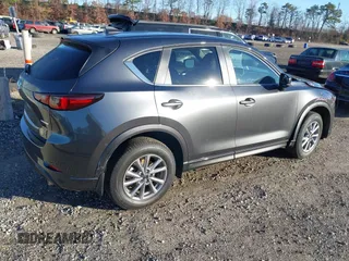 2024 Mazda CX-5 S Select with VIN JM3KFBBL1R0477504, listed as a IAAI auction lot 40894634 with 2,452 mi miles and . Bid and sale history available at carsss.com. Image 4.