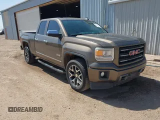 2015 GMC Sierra 1500 SLE z VIN 1GTV2UEC3FZ177124, wystawiony jako IAAI lot #42519541 z przebiegiem 189 763 mil mil oraz . Historia ofert i sprzedaży dostępna na DreamBid. Obrazek 1.