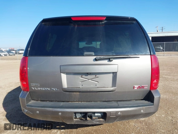 2012 GMC Yukon XL SLT with VIN 1GKS2KE73CR167820, listed as a IAAI auction lot 41462950 with 243,554 mi miles. Bid and sale history available at carsss.com. Image 16.