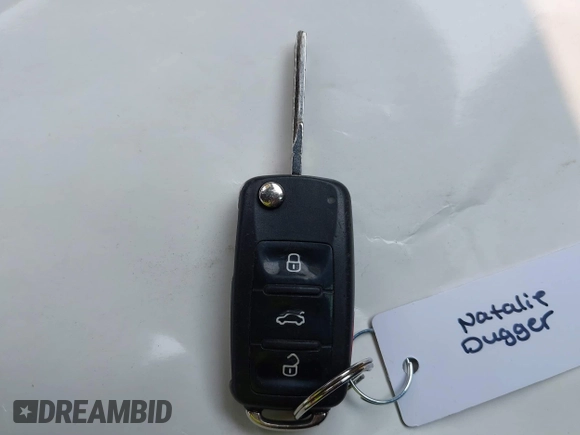 2013 Volkswagen Tiguan S with VIN WVGAV3AX2DW594334, listed as a IAAI auction lot 42405989 with 96,559 mi miles and . Bid and sale history available at DreamBid. Image 11.