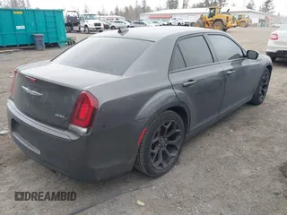 2019 Chrysler 300 S with VIN 2C3CCABG8KH601034, listed as a IAAI auction lot 41571454 with 104,632 mi miles and . Bid and sale history available at DreamBid. Image 4.