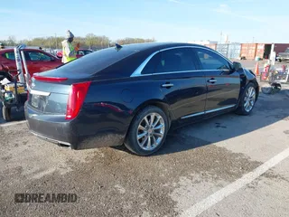 2013 Cadillac XTS Premium with VIN 2G61T5S32D9237829, listed as a IAAI auction lot 41863539 with 149,661 mi miles. Bid and sale history available at carsss.com. Image 4.