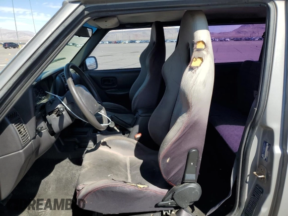 2000 Jeep Cherokee SE with VIN 1J4FF27SXYL140055, listed as a Copart auction lot 70315454 with 176,017 mi miles and Salvage title. Bid and sale history available at DreamBid. Image 7.