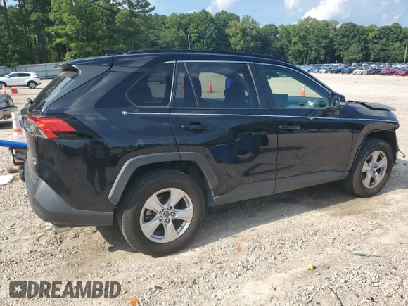 2019 Toyota RAV4 XLE with VIN JTMP1RFV7KD511381, listed as a Copart auction lot 63565625 with 95,470 mi miles and Salvage title. Bid and sale history available at DreamBid. Image 3.