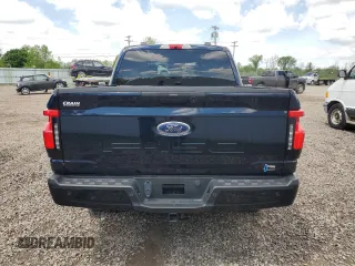 2022 Ford F-150 Lightning Pro z VIN 1FTVW1EL6NWG04931, wystawiony jako Copart lot #59096435 z przebiegiem 26 616 mil mil oraz Szkody całkowita. Historia ofert i sprzedaży dostępna na DreamBid. Obrazek 6.