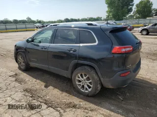 2016 Jeep Cherokee Latitude with VIN 1C4PJMCS6GW256117, listed as a Copart auction lot 59400015 with 152,279 mi miles and Salvage title. Bid and sale history available at DreamBid. Image 2.