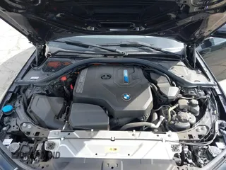 2022 BMW 3 Series 330e with VIN 3MW5P7J06N8C50460, listed as a IAAI auction lot 41688267 with 27,707 mi miles. Bid and sale history available at carsss.com. Image 10.