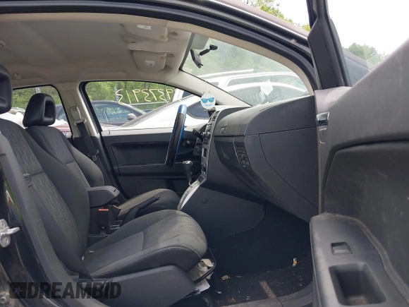 2008 Dodge Caliber SE with VIN 1B3HB28B58D753818, listed as a IAAI auction lot 39373913 with 172,972 mi miles and . Bid and sale history available at DreamBid. Image 5.