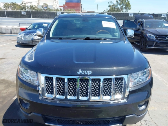 2012 Jeep Grand Cherokee Overland with VIN 1C4RJFCT7CC185602, listed as a IAAI auction lot 42018715 with 91,507 mi miles. Bid and sale history available at carsss.com. Image 12.