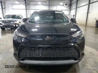 2025 Toyota Corolla Cross Hybrid S with VIN 7MUFBABG9SV065228, listed as a Copart auction lot 58408535 with 14,965 mi miles and Salvage title. Bid and sale history available at DreamBid. Image 5.