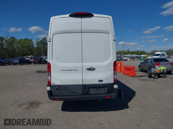 2022 Ford Transit Cargo with VIN 1FTBW3X80NKA69156, listed as a IAAI auction lot 42059236 with 100,096 mi miles and . Bid and sale history available at DreamBid. Image 16.