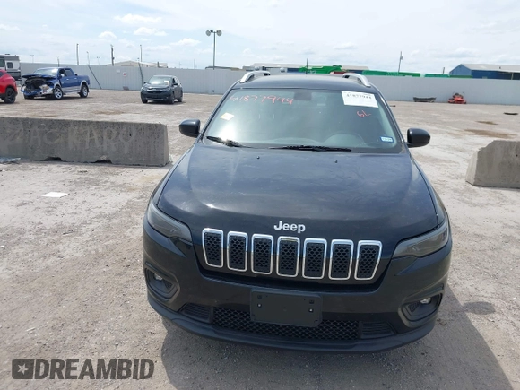 2019 Jeep Cherokee Latitude with VIN 1C4PJLCBXKD284954, listed as a IAAI auction lot 41877944 with 134,931 mi miles. Bid and sale history available at carsss.com. Image 6.