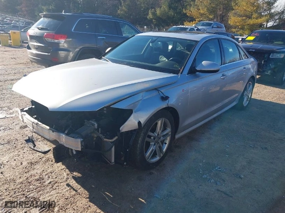 2012 Audi A6 3.0T Prestige with VIN WAUHGAFCXCN136954, listed as a IAAI auction lot 41204962 with 144,261 mi miles. Bid and sale history available at carsss.com. Image 2.