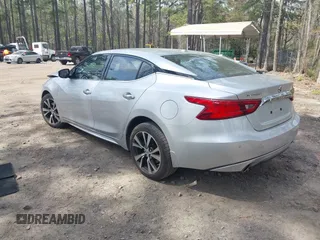 2016 Nissan Maxima SL with VIN 1N4AA6AP9GC406406, listed as a IAAI auction lot 41954790 with 139,380 mi miles and . Bid and sale history available at DreamBid. Image 3.