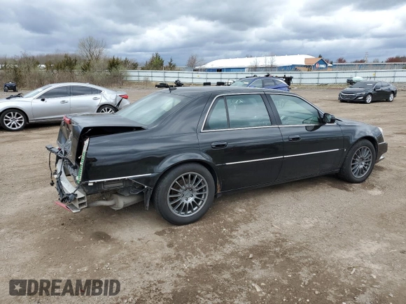 2007 Cadillac DTS Performance with VIN 1G6KD57937U201301, listed as a Copart auction lot 52868565 with 119,972 mi miles and Salvage Title. Bid and sale history available at carsss.com. Image 3.