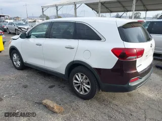 2019 Kia Sorento LX V6 with VIN 5XYPGDA54KG468077, listed as a IAAI auction lot 41556502 with 143,218 mi miles. Bid and sale history available at carsss.com. Image 3.