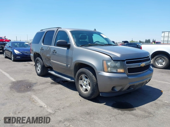 2007 Chevrolet Tahoe LT with VIN 1GNFC13J87R242057, listed as a IAAI auction lot 42736911 with 162,569 mi miles and . Bid and sale history available at DreamBid. Image 1.