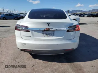 2013 Tesla Model S with VIN 5YJSA1CGXDFP21051, listed as a Copart auction lot 48377775 with 125,472 mi miles and Salvage Title. Bid and sale history available at carsss.com. Image 6.
