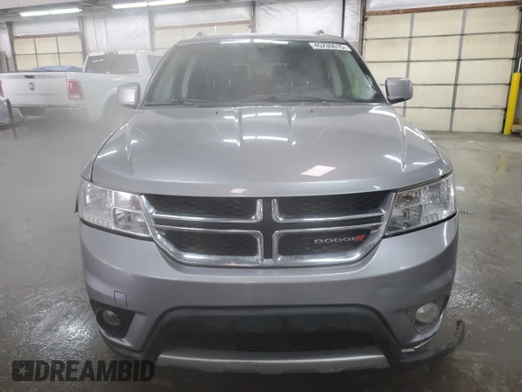 2017 Dodge Journey SXT с VIN 3C4PDDBG6HT592216, выставлен на аукционе Copart как лот 45230615 с пробегом 97 424 миль миль и Списание • Salvage title. История ставок и продаж доступна на DreamBid. Изображение 5.