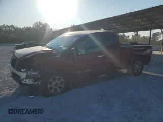 2006 Nissan Titan SE with VIN 1N6BA06B26N519672, listed as a Copart auction lot 74880744 with 144,568 mi miles and Salvage Title. Bid and sale history available at carsss.com. Image 1.