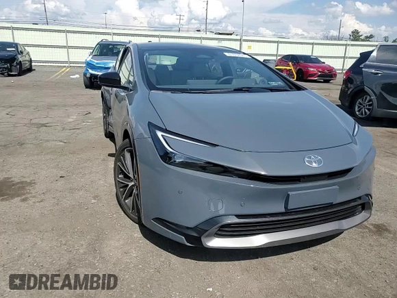 2024 Toyota Prius LE z VIN JTDADABU4R3021525, wystawiony jako Copart lot #61652045 z przebiegiem 2 120 mil mil oraz Szkoda całkowita • Salvage title. Historia ofert i sprzedaży dostępna na DreamBid. Obrazek 13.