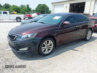2011 Kia Optima EX z VIN KNAGN4A77B5054305, wystawiony jako IAAI lot #42387864 z przebiegiem 147 229 mil mil oraz . Historia ofert i sprzedaży dostępna na DreamBid. Obrazek 2.