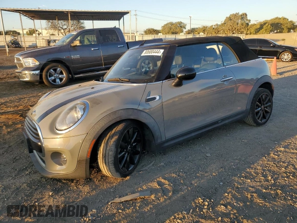 2017 MINI Convertible Cooper with VIN WMWWG5C35H3D00104, listed as a Copart auction lot 80680444 with 33,581 mi miles and Salvage title. Bid and sale history available at DreamBid. Image 1.