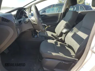 2019 Ford Fiesta SE z VIN 3FADP4EJ5KM106732, wystawiony jako Copart lot #55856145 z przebiegiem 79 778 mil mil oraz Szkody całkowita. Historia ofert i sprzedaży dostępna na DreamBid. Obrazek 7.