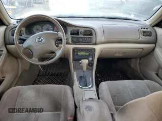 2002 Mazda 626 LX with VIN 1YVGF22C525277646, listed as a Copart auction lot 83109424 with 202,380 mi miles and Salvage Title. Bid and sale history available at carsss.com. Image 8.