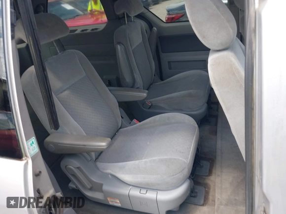 2007 Ford Freestar SEL z VIN 2FMZA52217BA00979, wystawiony jako IAAI lot #42151101 z przebiegiem 112 806 mil mil oraz . Historia ofert i sprzedaży dostępna na DreamBid. Obrazek 8.