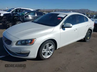 2015 Volvo S60 T5 Drive-E Premier z VIN YV140MFB4F2301427, wystawiony jako IAAI lot #41677045 z przebiegiem 103 262 mil mil oraz . Historia ofert i sprzedaży dostępna na DreamBid. Obrazek 18.