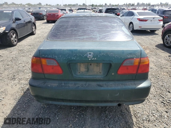1999 Honda Civic VP z VIN 2HGEJ6618XH522162, wystawiony jako Copart lot #54427665 z przebiegiem 320 807 mil mil oraz Szkoda całkowita • Salvage title. Historia ofert i sprzedaży dostępna na DreamBid. Obrazek 6.