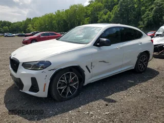 2023 BMW X4 M40i with VIN 5UX43DT08P9P53629, listed as a Copart auction lot 64718275 with 41,779 mi miles and Salvage title. Bid and sale history available at DreamBid. Image 1.